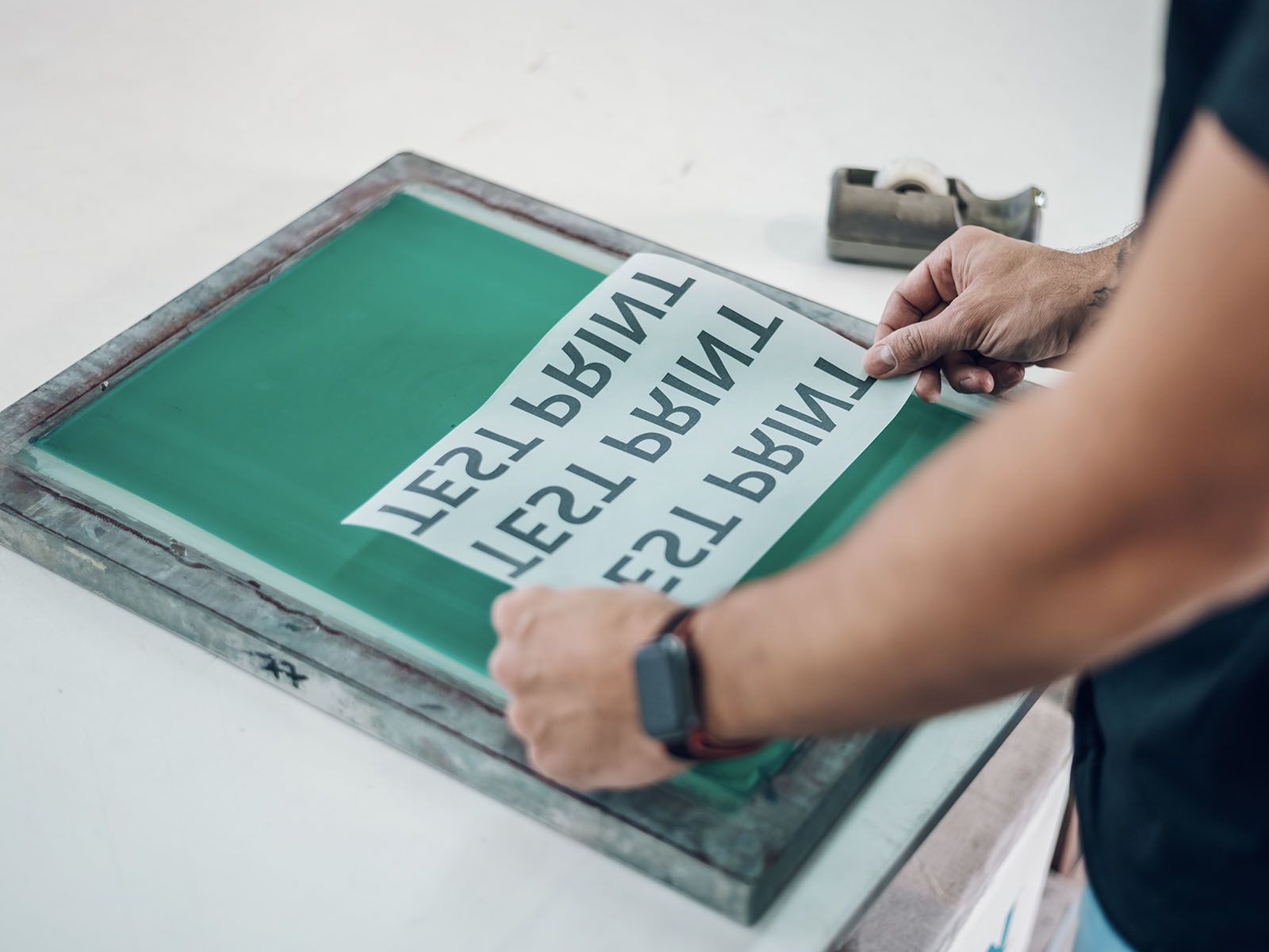 ThreadCo Print Shop production — screen printing and embroidery